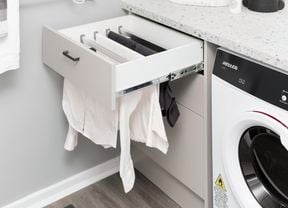 Laundry drawer with drying rack.