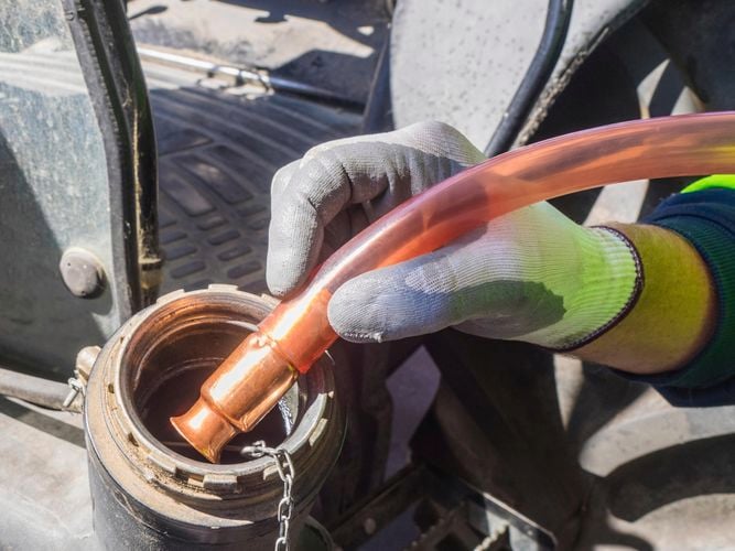 Jiggle hose in use to move water