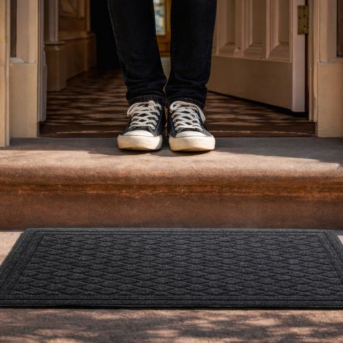 Mat with anti slip backing, durable and easy to clean.