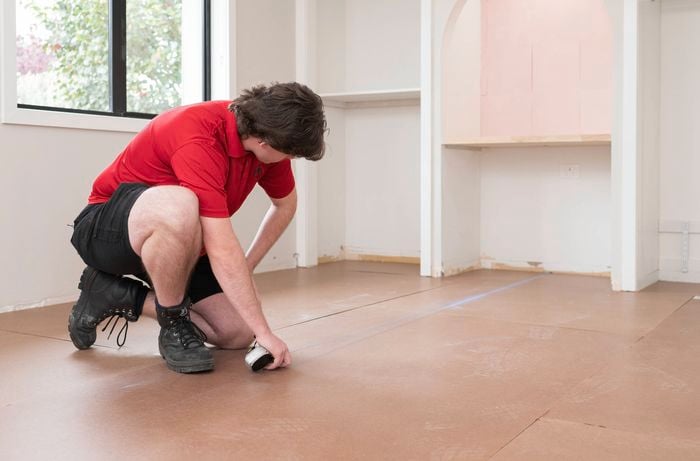 Measure and divide the room into with a chalk line 