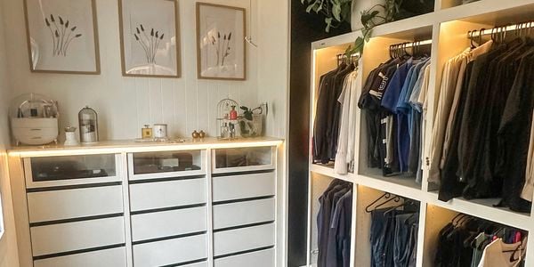 Flatpack custom wardrobe design in a bedroom with in built lighting