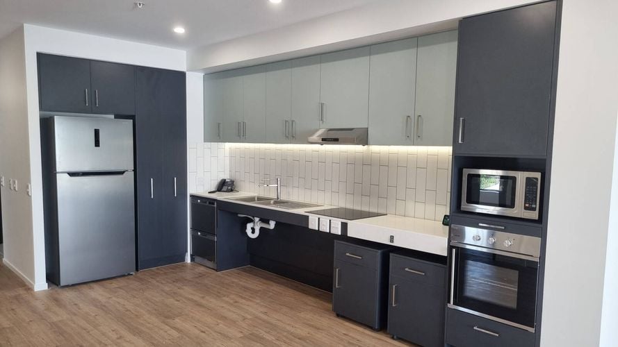 Assisted living height adjustable benchtops in kitchen