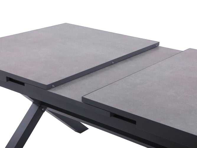 Close up of the tabletop of an extendable ceramic outdoor dining table