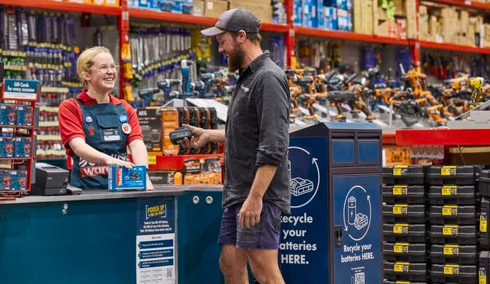 customer recycling old battery at bunnings store