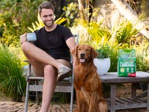 Man sitting with his dog.