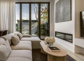 Sheer curtains add privacy and a luxe touch.