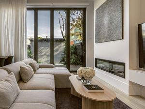 Sheer curtains add privacy and a luxe touch.
