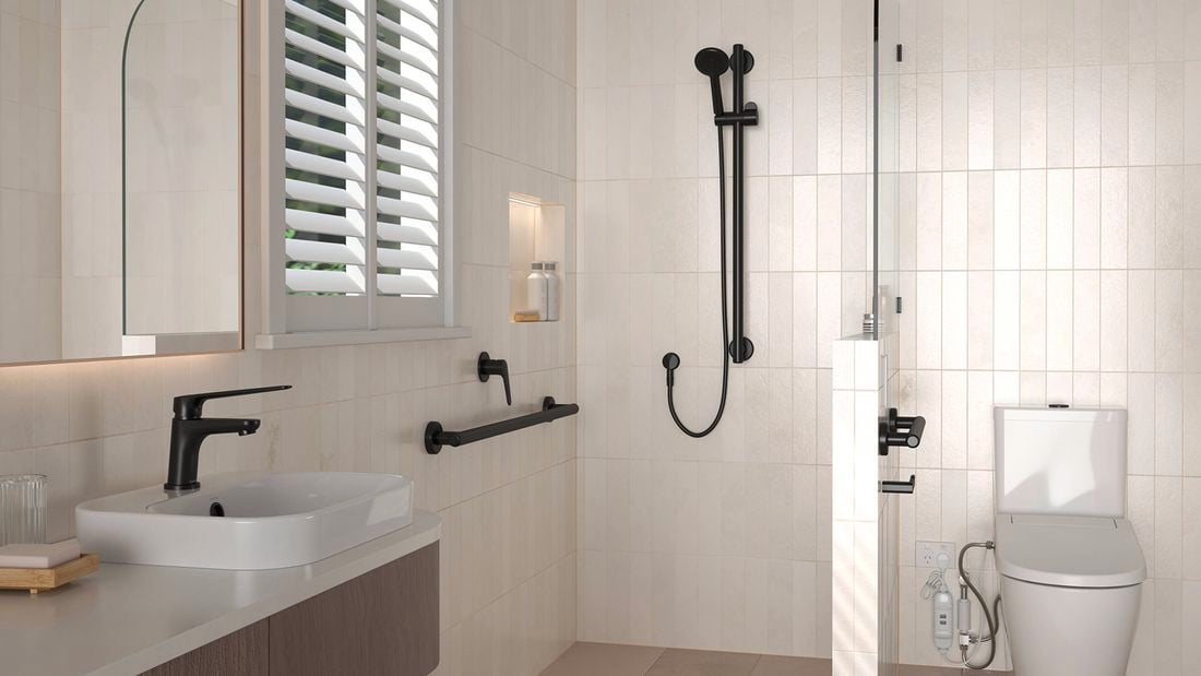 Accessible bathroom with grab rails, tapware and fixtures, illustrating how to upgrade your home for assisted living needs.