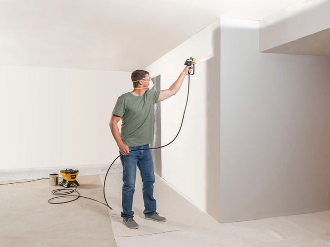 Wagner Control Pro 150M with T2 gun to spray interior of home with off-white paint.