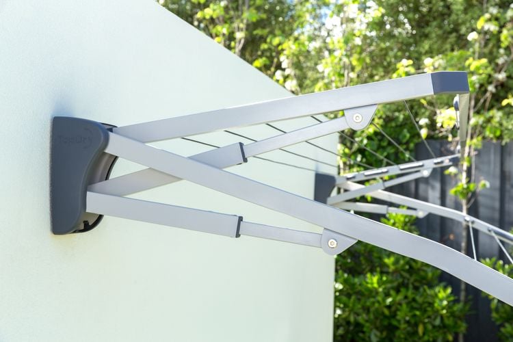 Side view of a TopDry wall mounted clothesline