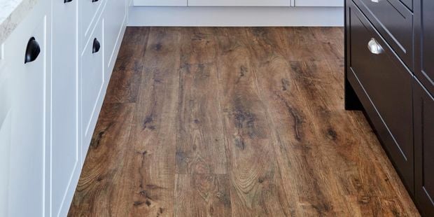 Kitchen with timber floorboards.