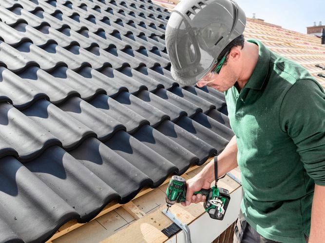 man working with tools