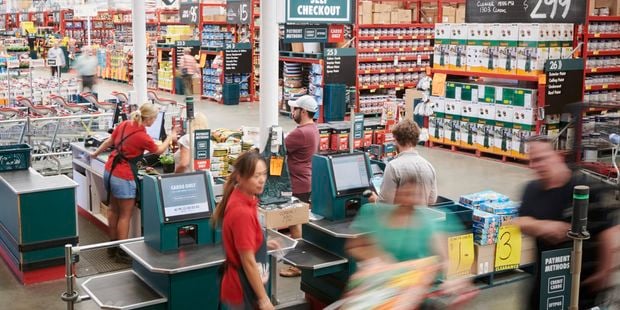 Bunnings Team Members and customers in the Bunnings Mentone store.