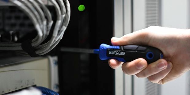 A Kincrome screwdriver being used in the workplace