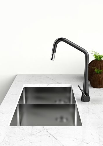Kitchen benchtop with black sink and tapware