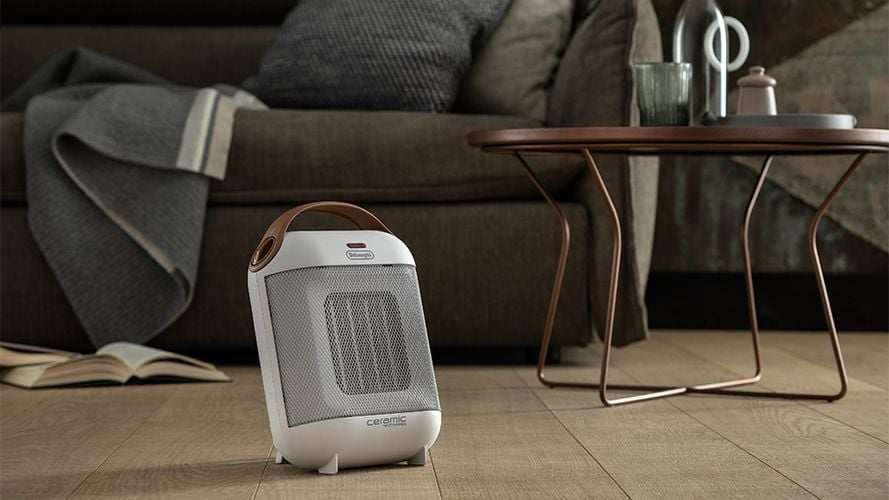 A small portable heater in a lounge setting