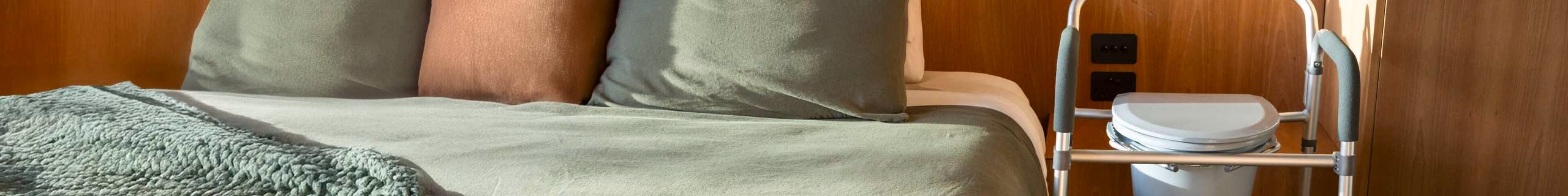 Header image of Q assist bed side railing attached to a bed