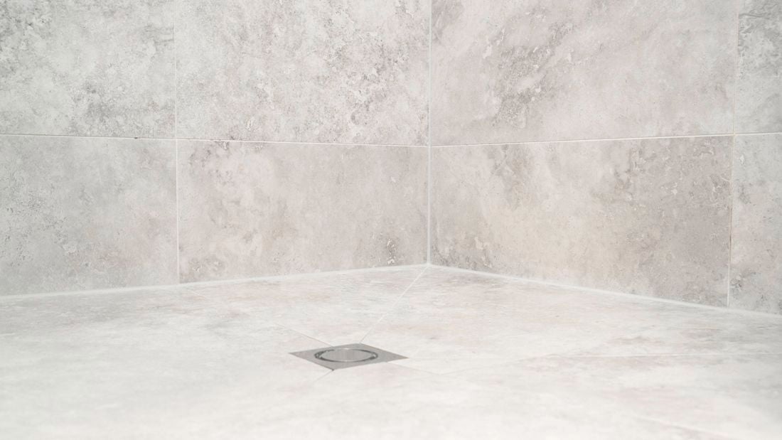 Freshly applied silicone sealant in a bathroom​