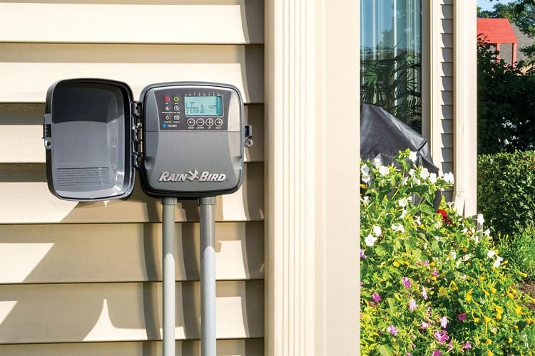 Automated watering timer unit connected to a garden tap