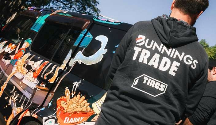 Person wearing Bunnings x Tiacs hoodie