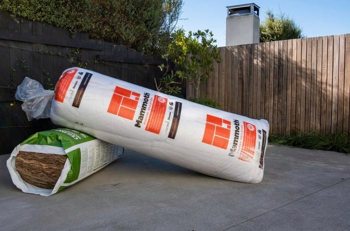 Two packs of insulation batts of different types