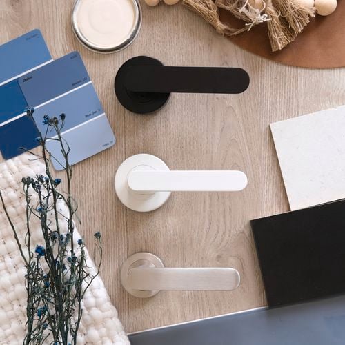 White,
  stainless steel and black door handles