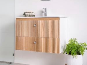 A finished vanity with dowel front panel