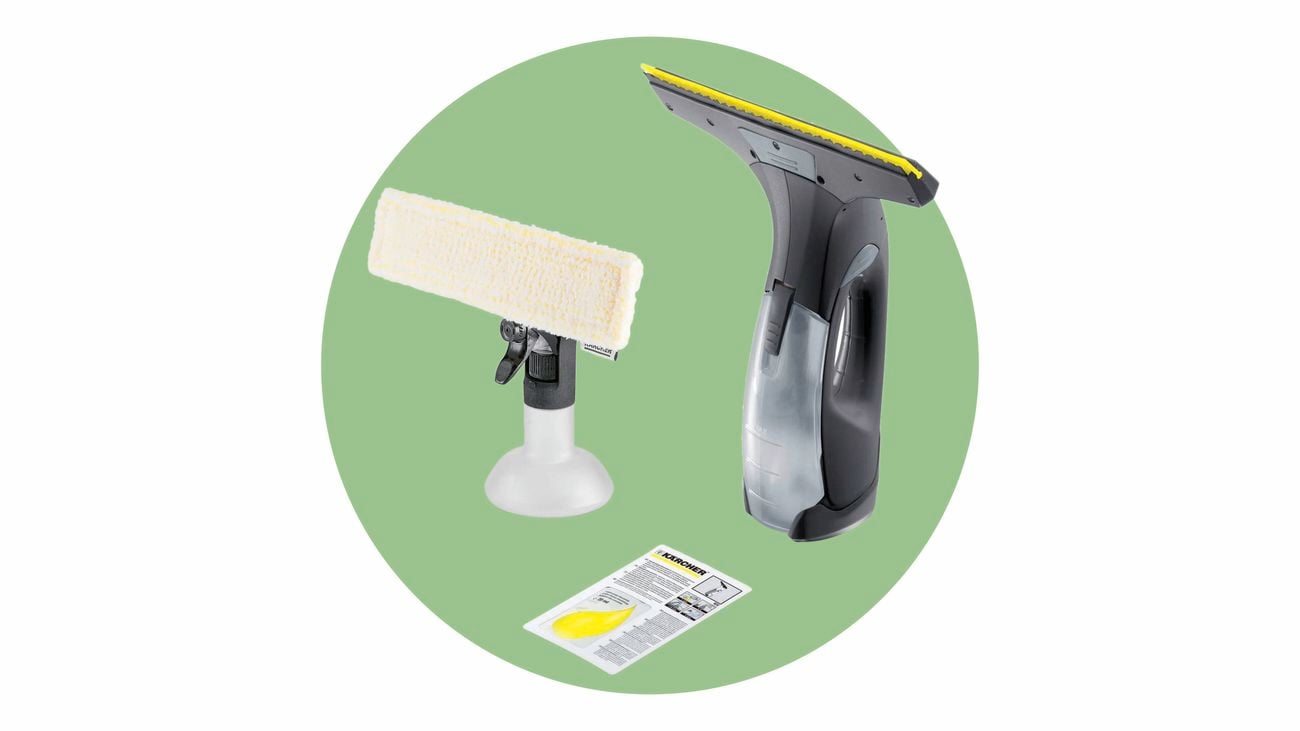 A close-up product shot on a green background of a Karcher window cleaner used for spring cleaning