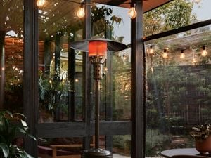 A patio heater in an outdoor entertaining area.