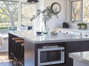 Open plan kitchen with a island bench