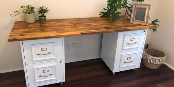 A D.I.Y. timber desk incorporating two filing cabinets