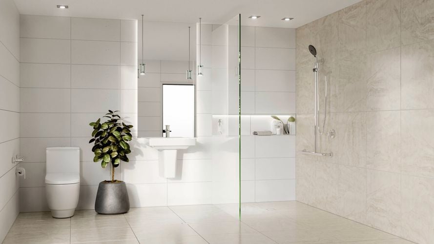 A bathroom with tiles on the wall and floors, with a toilet, basin and shower in it.