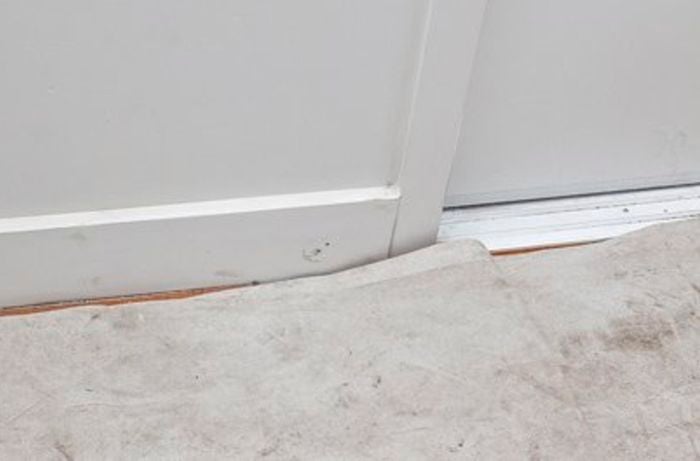 Drop sheet on the floor.