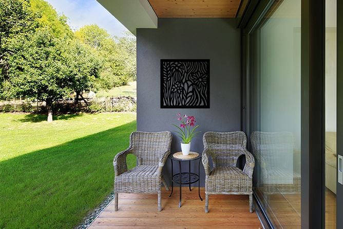 Backyard to home with timber decking and large grass yard