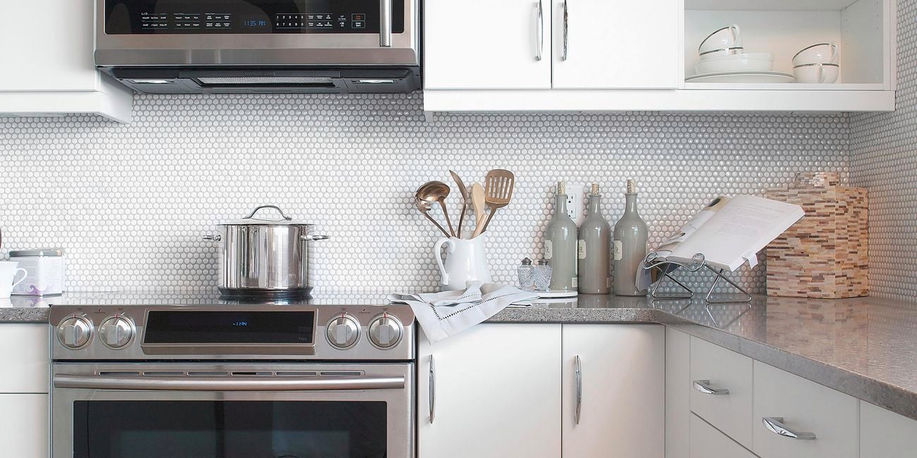 Kitchen with L-shaped benchtop and stainless steel oven