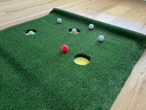 It’s time to bring the golf Masters to your home with this indoor putting green. 