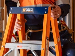 Person standing on Citeco ladder