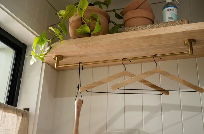 Close up of hanging rails over the sink.