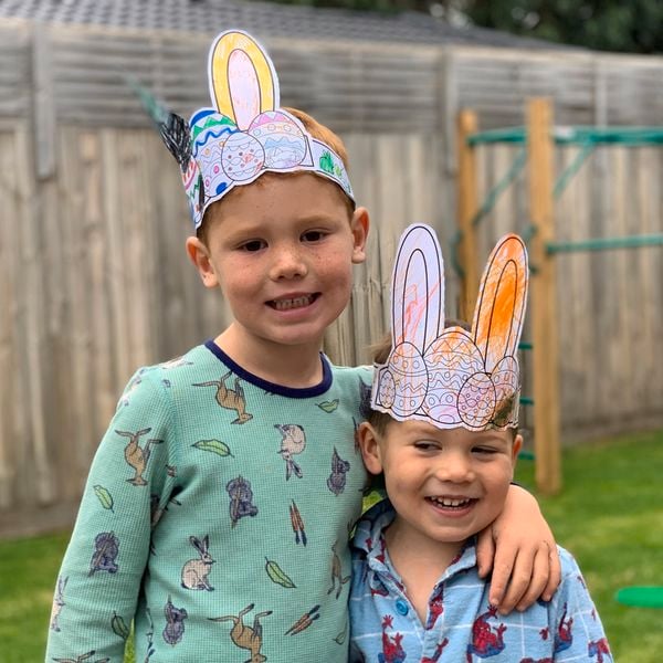 Kids wearing Easter bunny ear paper ears.