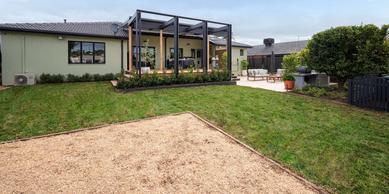 The back of a house with an entertaining area int it