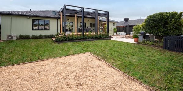 The back of a house with an entertaining area int it