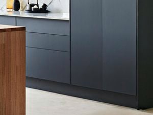 Kitchen with black cabinets.