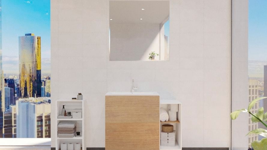 Bathroom with mirror along with low height wash basin, storage shelves and white wall tiles.