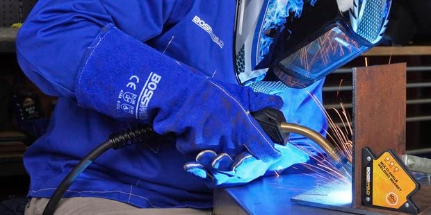 MIG welding and holding in work piece together with a Bossweld multi-angle welding Magnet.