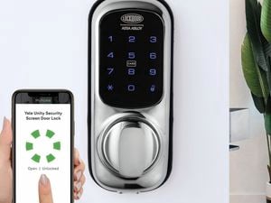 Hand holds phone with a loading screen on it. A door with a smart lock is also pictured, which the phone is wirelessly connecting to