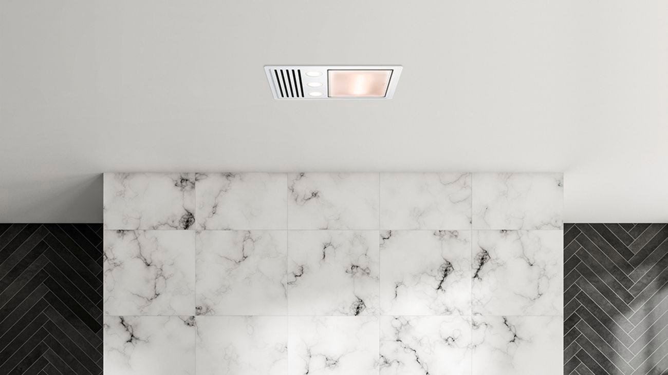 vented  3 in 1 light , fan and heater in a bathroom