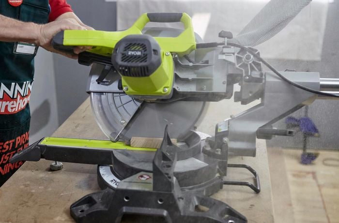 A circular saw used to cut a 30 degree corner into a panel of wood