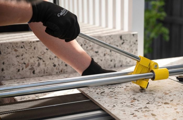 Cutting the tile to the size.