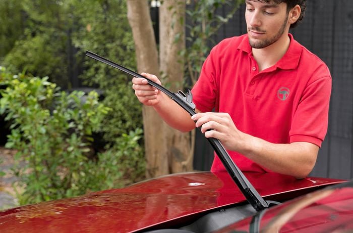 Attach windshield wiper blade to windshield wiper arm  