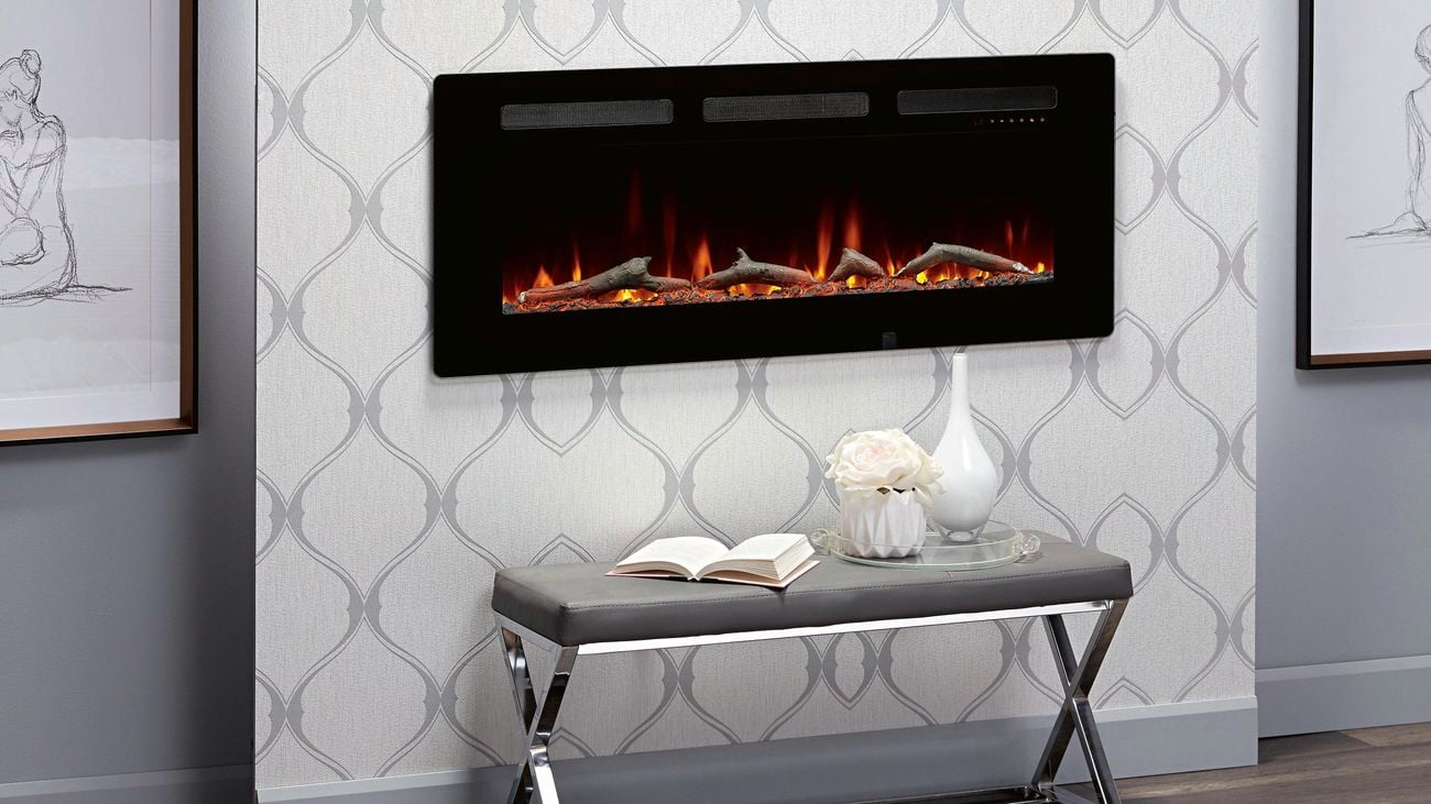 Bedroom with fireplace on the wall